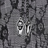 Faltenrock mit Punk-Muster