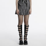 Faltenrock mit Punk-Muster