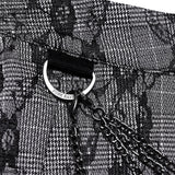 Faltenrock mit Punk-Muster