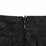 Faltenrock mit Punk-Muster