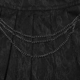 Faltenrock mit Punk-Muster
