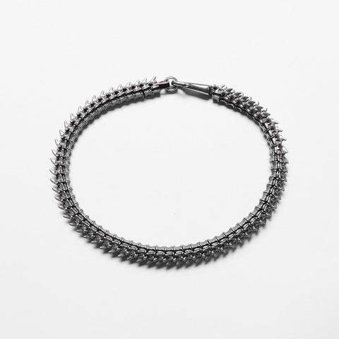 Halsketten-Set mit Wirbelsäulenkreuz