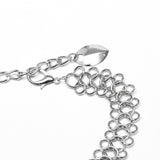 Brustkette mit Metallschuppen